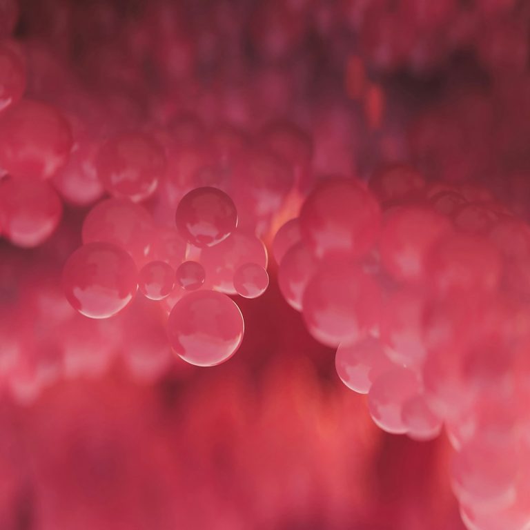 Abstract macro photography of clear bubbles representing extracellular vesicles conceptually